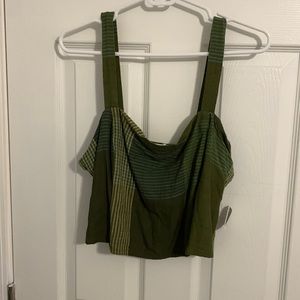 Two piece set with crop top and skirt. Never worn, tag still attached.